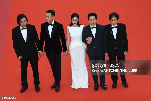 South Korean director Lee Chang-Dong, South Korean actor Yoo Ah-in, South Korean actress Jun Jong Seo, US-South Korean actor Steven Yeun and South...