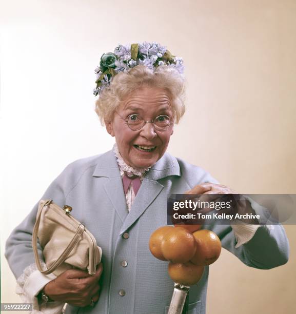 Grandma feeling oranges in 1973.