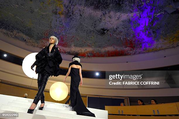 Models present creation as part of a Biodiversity fashion show at the European headquarters of the United Nations in Geneva on January 21, 2010....