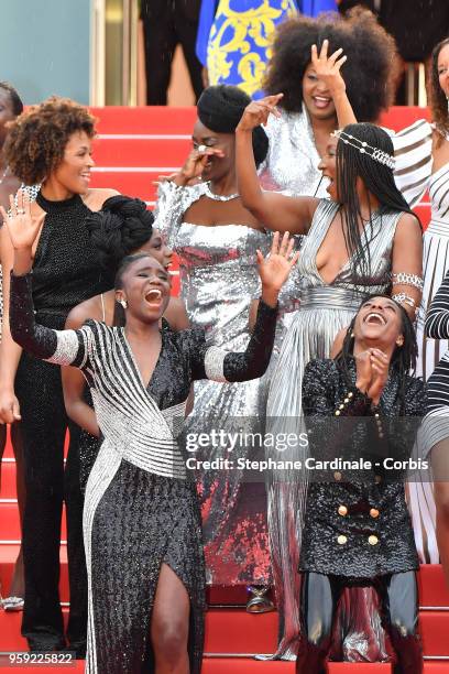 Authors of the book "Noire N'est Pas Mon Métier" dnace on the stairs at the screening of "Burning" during the 71st annual Cannes Film Festival at...