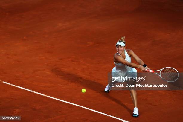 Elena Vesnina of Russia returns a backhand in her match against Venus Williams of USA during day 4 of the Internazionali BNL d'Italia 2018 tennis at...