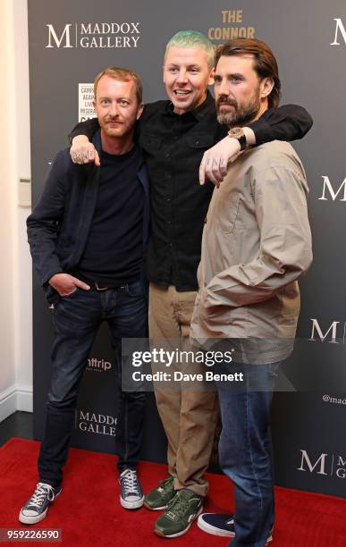 Mike Snelle, Professor Green and James Golding attend a private view of The Connor Brothers new exhibition "Call Me Anything But Ordinary" featuring...
