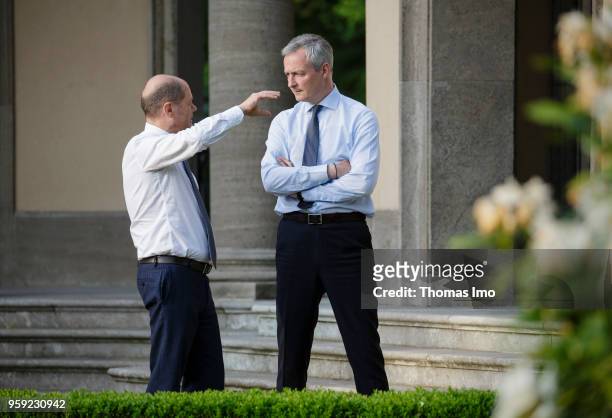 German Finance Minister Olaf Scholz welcomes his French counterpart Bruno Le Maire for talks at the Villa Borsig on May 16, 2018 in Berlin, Germany....