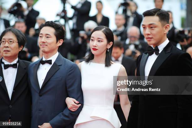 Executive producer Jun-dong Lee, actor Steven Yeun, actress Jong-seo Jeon, actor Ah-in Yoo and director Chang-dong Lee attend the screening of...