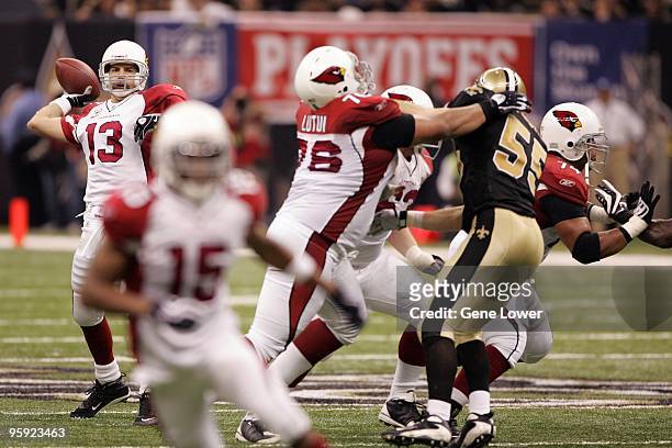 Arizona Cardinals quarterback Kurt Warner unleashes a pass against the New Orleans Saints during the NFC Divisional Playoff Game at the Louisana...