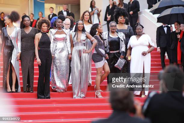 Authors of the book "Noire N'est Pas Mon Métier" pose on the stairs at the screening of "Burning" during the 71st annual Cannes Film Festival at...