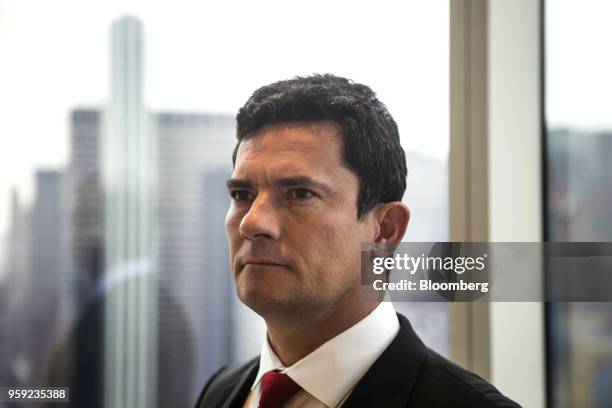 Brazilian Federal Judge Sergio Moro stands for a photograph before an interview in New York, U.S., on Wednesday, May 16, 2018. Moro is the lead...