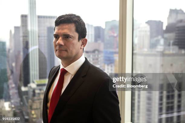 Brazilian Federal Judge Sergio Moro stands for a photograph before an interview in New York, U.S., on Wednesday, May 16, 2018. Moro is the lead...