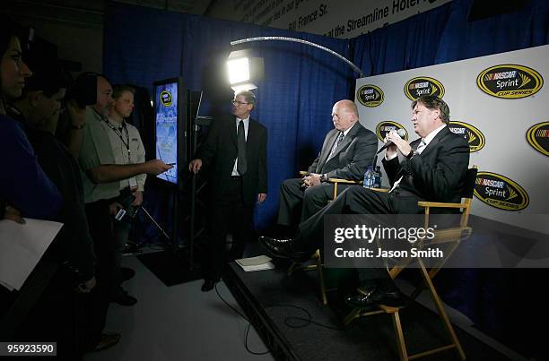 Vice President of Competition Robin Pemberton speaks with the media, as Sprint Cup Series Director John Darby looks on, during the NASCAR Sprint...