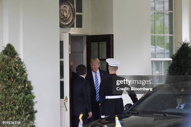 President Donald Trump, center, speaks with Shavkat Mirziyoev, Uzbekistan's president, after a meeting at the White House in Washington, D.C., U.S.,...