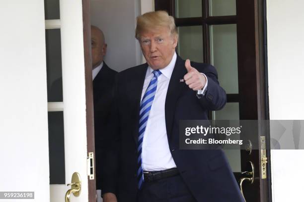President Donald Trump gives a thumbs up after a meeting with Shavkat Mirziyoev, Uzbekistan's president, at the White House in Washington, D.C.,...