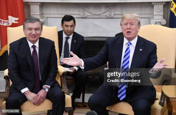 President Donald Trump, right, speaks as Shavkat Mirziyoev, Uzbekistan's president, listens during a meeting in the Oval Office of the White House in...