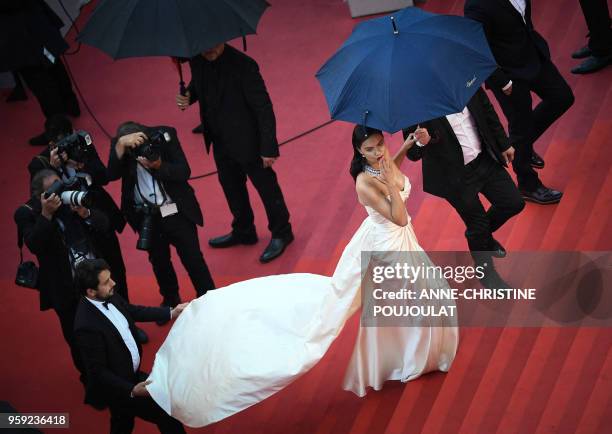 Brazilian model Adriana Lima arrives on May 16, 2018 for the screening of the film "Burning" at the 71st edition of the Cannes Film Festival in...