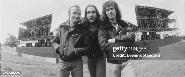 English rock band Genesis in front of the stage of A Midsummer Night's Dream festival, Knebworth Festival, UK, 22nd June 1978; Phil Collins, Mike...