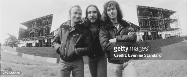 English rock band Genesis in front of the stage of A Midsummer Night's Dream festival, Knebworth Festival, UK, 22nd June 1978; Phil Collins, Mike...