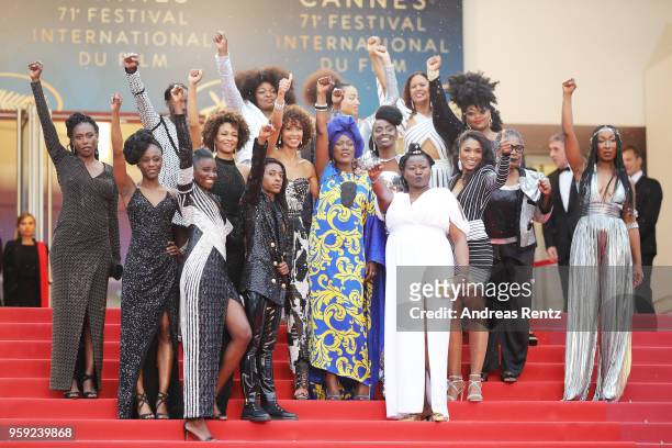Authors of the book "Noire N'est Pas Mon Métier" pose on the stairs with Jury member Khadja Nin at the screening of "Burning" during the 71st annual...