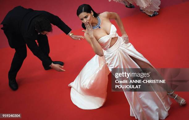 Brazilian model Adriana Lima poses as she arrives on May 16, 2018 for the screening of the film "Burning" at the 71st edition of the Cannes Film...