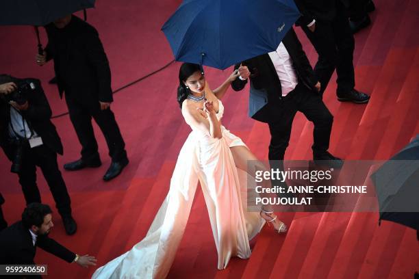 Brazilian model Adriana Lima arrives on May 16, 2018 for the screening of the film "Burning" at the 71st edition of the Cannes Film Festival in...