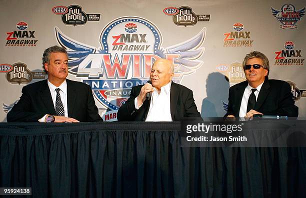 ZMax Dragway owner Bruton Smith speaks to the media as NHRA President Tom Compton , and NHRA driver John Force look on, during the NASCAR Sprint...