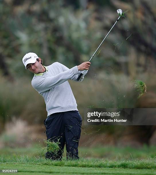 Rohan Blizard of Australia plays an approach shot out of the rough at Clearwater Golf Course on January 22, 2010 in Christchurch, New Zealand.