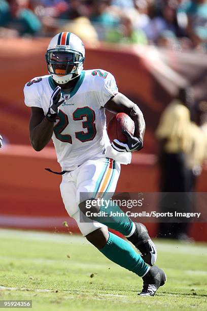 Ronnie Brown of the Miami Dolphins carries the ball during a NFL game against the Tampa Bay Buccaneers at Land Shark Stadium on November 15, 2009 in...