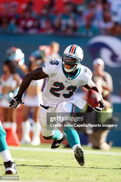 Ronnie Brown of the Miami Dolphins carries the ball during a NFL game against the Tampa Bay Buccaneers at Land Shark Stadium on November 15, 2009 in...