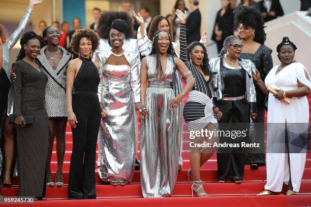 Authors of the book "Noire N'est Pas Mon Métier" pose on the stairs at the screening of "Burning" during the 71st annual Cannes Film Festival at...