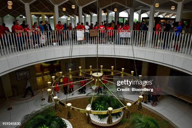 Teachers and supporters hold signs during a 'March For Students And Rally For Respect' protest at the North Carolina State Assembly, on the first day...