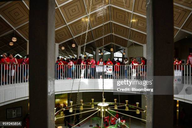 Teachers and supporters hold signs during a 'March For Students And Rally For Respect' protest at the North Carolina State Assembly, on the first day...