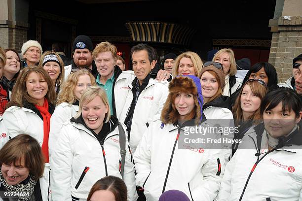 Sundance Institute President and Founder Robert Redford and designer Kenneth Cole pose with 2010 Sundance Film Festival volunteers outside the...
