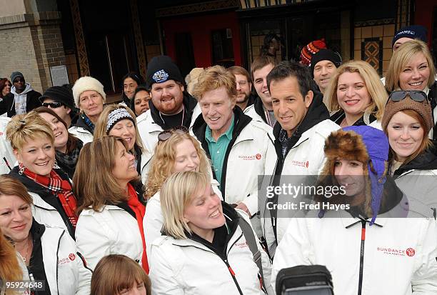 Sundance Institute President and Founder Robert Redford and designer Kenneth Cole pose with 2010 Sundance Film Festival volunteers outside the...