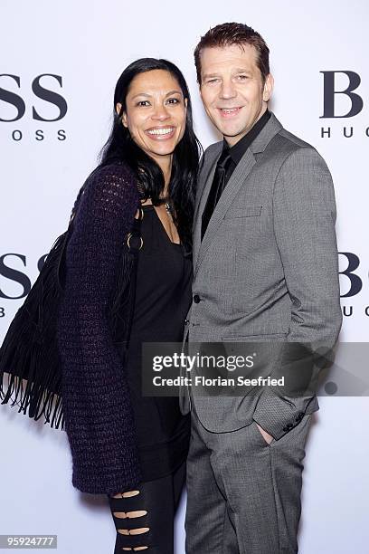 Actor Kai Wiesinger and wife, actress Chantal de Freitas arrive at the BOSS Black Fashion Show during the Mercedes-Benz Fashion Week Berlin...