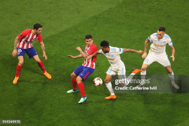 L-r Sime Vrsaljko and Angel Correa of Atletico Madrid compete for the ball with Jordan Amavi and Lucas Ocampos of Marseille during the UEFA Europa...