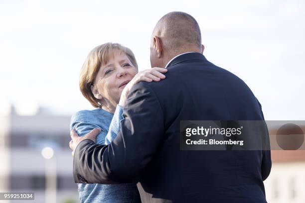 Angela Merkel, Germany's chancellor, is greeted by Boyko Borissov, Bulgaria's prime minister, while arriving for a European Union heads of state...