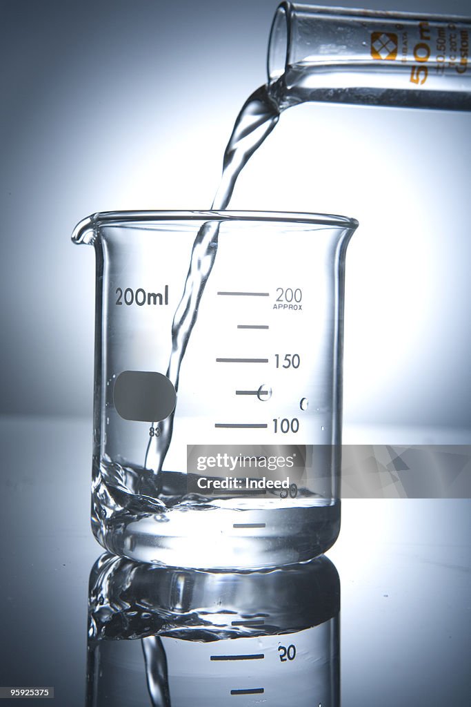 Liquid pouring into a beaker