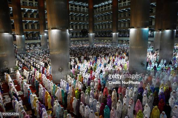 Muslims perform the first 'Tarawih' prayer on the eve of the Islamic holy month of Ramadan at Istiqlal Mosque in Jakarta, Indonesia on May 16, 2018.