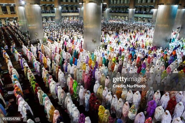 Muslims perform the first 'Tarawih' prayer on the eve of the Islamic holy month of Ramadan at Istiqlal Mosque in Jakarta, Indonesia on May 16, 2018.