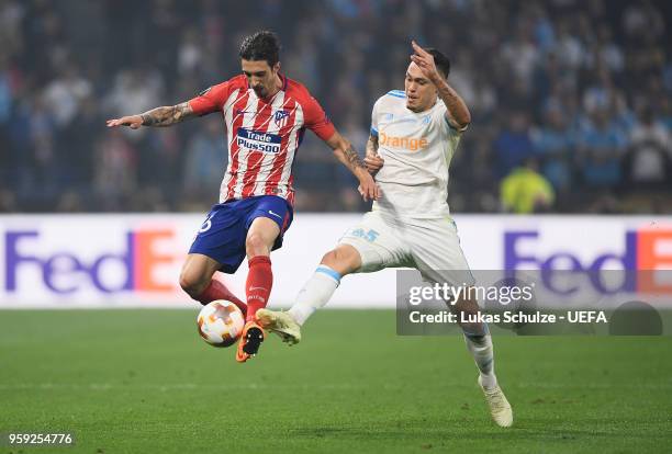 Sime Vrsaljko of Atletico Madrid holds off pressure from Lucas Ocampos of Marseille during the UEFA Europa League Final between Olympique de...