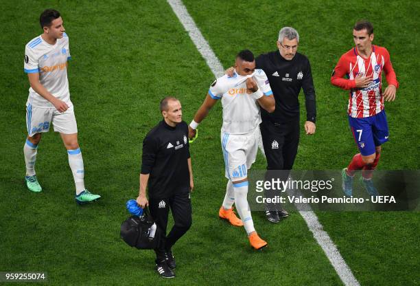 Dimitri Payet of Marseille looks dejected as he walks off the pitch after picking up an injury during the UEFA Europa League Final between Olympique...