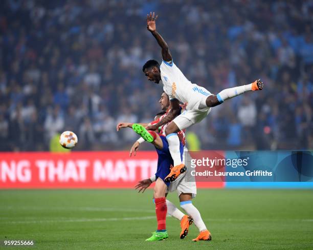 Andre-Frank Zambo Anguissa of Marseille challenges Gabi of Atletico Madrid during the UEFA Europa League Final between Olympique de Marseille and...
