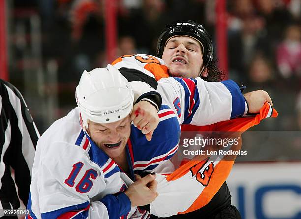 Dan Carcillo of the Philadelphia Flyers fights Sean Avery of the New York Rangers in the second period on January 21, 2010 at the Wachovia Center in...