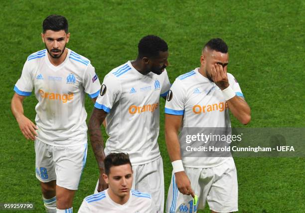 Dimitri Payet of Marseille looks dejected as he walks off the pitch after picking up an injury during the UEFA Europa League Final between Olympique...