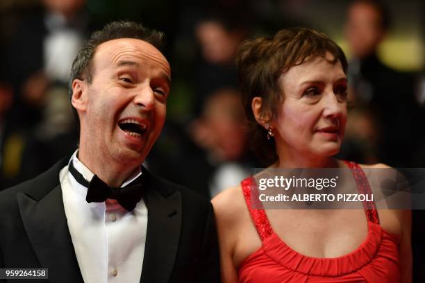 Italian actress and producer Nicoletta Braschi and her husband, Italian actor and director Roberto Benigni arrive on May 16, 2018 for the screening...