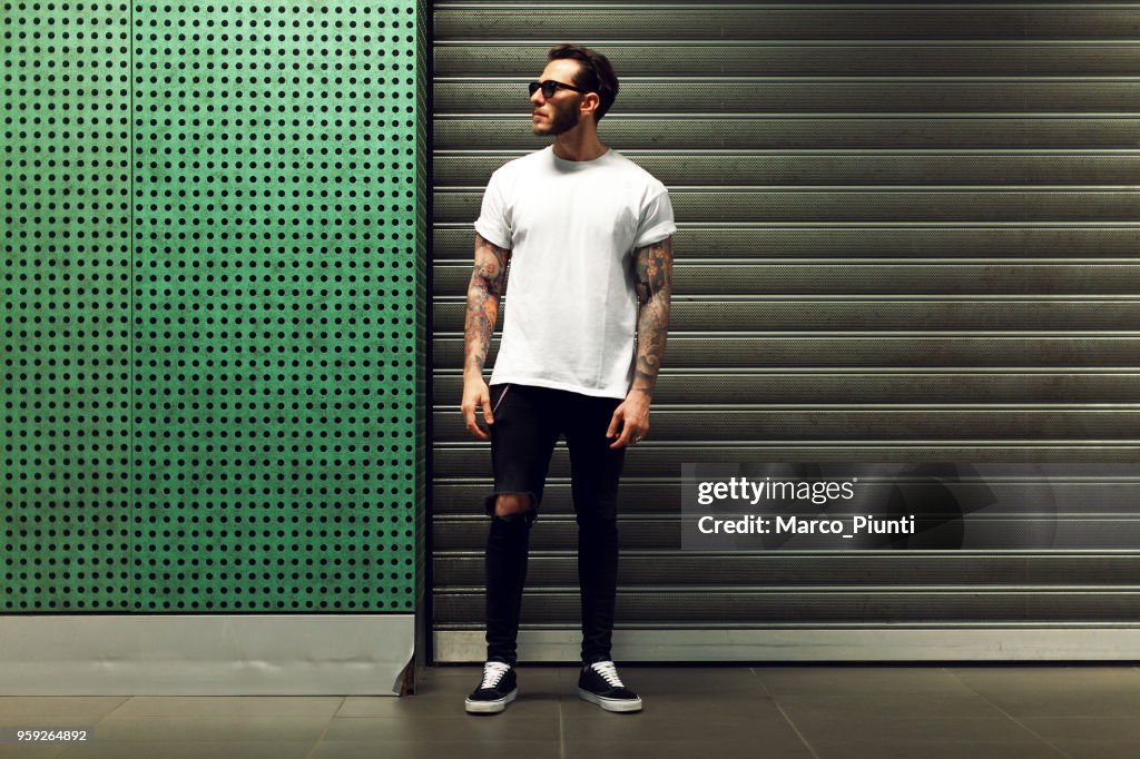 Portrait of tattooed young man