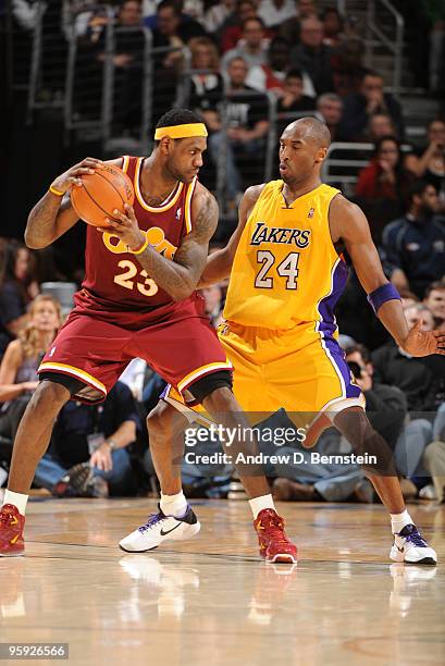 LeBron James of the Cleveland Cavaliers positions himself against Kobe Bryant of the Los Angeles Lakers on January 21, 2010 at The Quicken Loans...