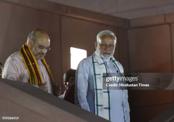Prime Minister Narendra Modi and BJP president Amit Shah at the BJP Head office after BJP emerged as the single largest party in Karnataka Assembly...