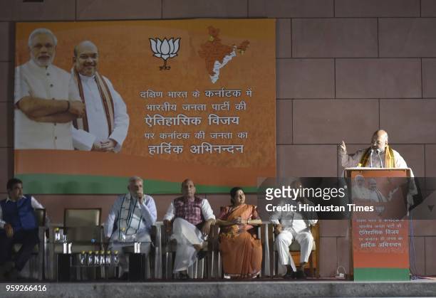 President Amit Shah speaks as Minister of Social Justice and Empowerment Thawar Chand Gehlot , Minister of External Affairs Sushma Swaraj , Union...