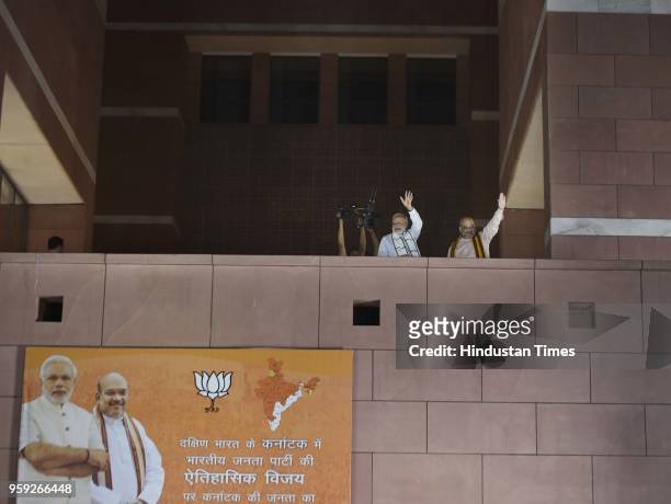 Prime Minister Narendra Modi and BJP president Amit Shah at the BJP Head office after BJP emerged as the single largest party in Karnataka Assembly...