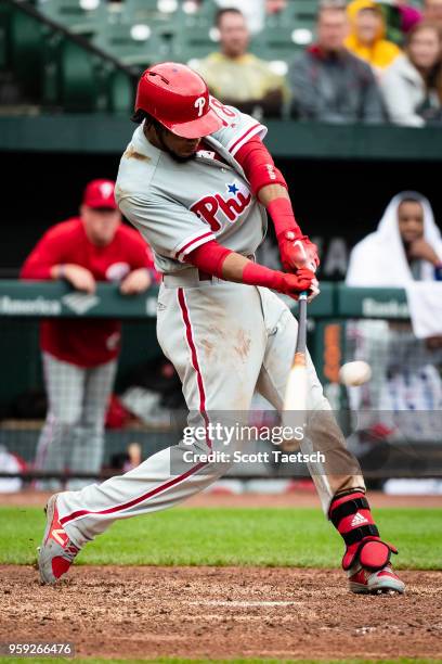 Pedro Florimon of the Philadelphia Phillies singles during the eighth inning against the Baltimore Orioles at Oriole Park at Camden Yards on May 16,...