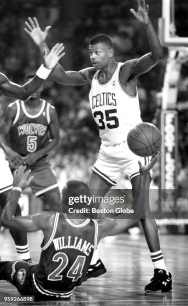 Boston Celtics' Reggie Lewis guards Minnesota's Michael Williams . The Boston Celtics host the Minnesota Timberwolves in their opening game of the...